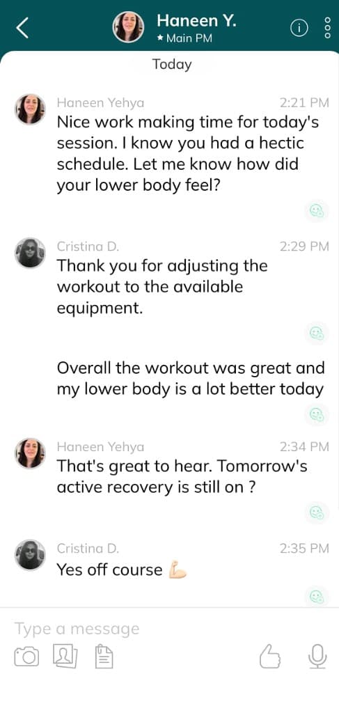 Coach checking in with a client between workouts in the everybody app