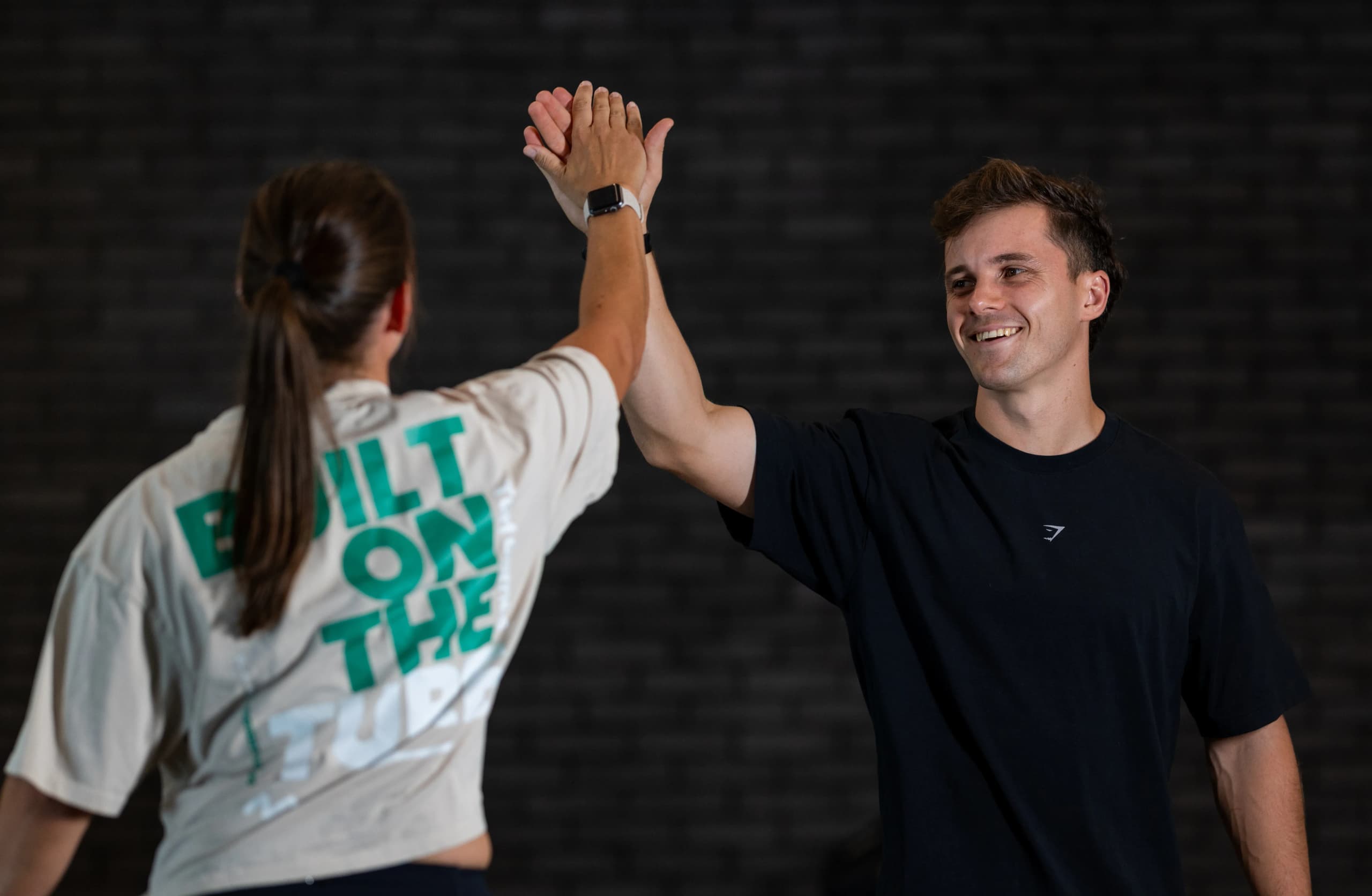 everybody fitness coach and client celebrating progress in Dubai